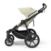 Thule Urban Glide 4-wheel universālie ratiņi 2in1 Beige