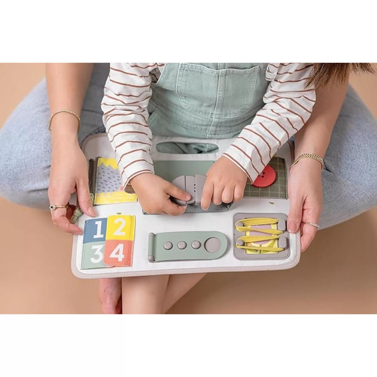 Taf Toys aktivitāšu dēlis ar sprādzēm – foto 2