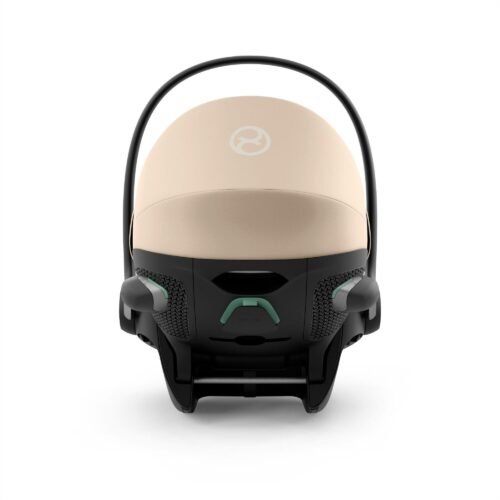 Cybex autokrēsliņš bēšā krāsā ar melnu rokturi un ventilācijas atverēm