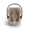 Cybex Cloud T i-Size bēšs autokrēsliņš ar rokturi un iekšējām drošības jostām