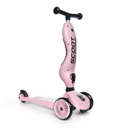 Rozā Scoot and Ride Highwaykick 1 skrejritenis ar melniem rokturiem un trim riteņiem