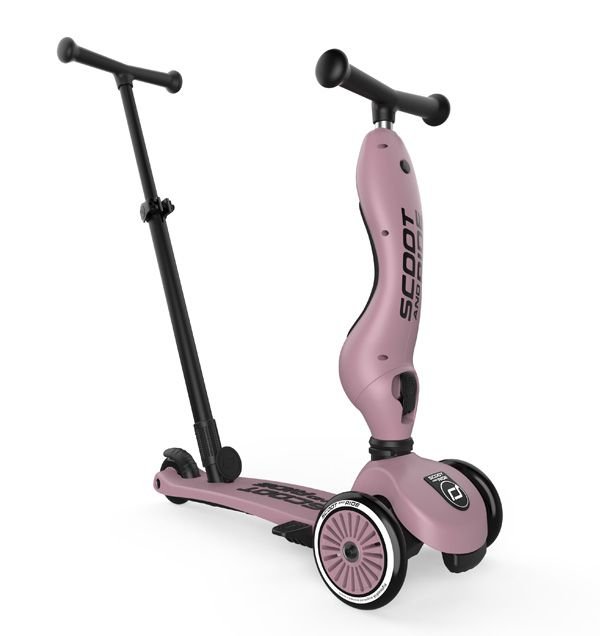 Scoot and Ride Highwaykick 1 rozā skrejritenis ar stūmējrokturi un trim riteņiem
