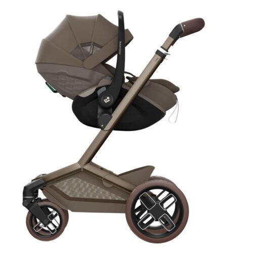 Maxi-Cosi Pebble Slide Pro autokrēsliņš un bērnu ratiņi brūnā krāsā ar kulbu un lieliem riteņiem