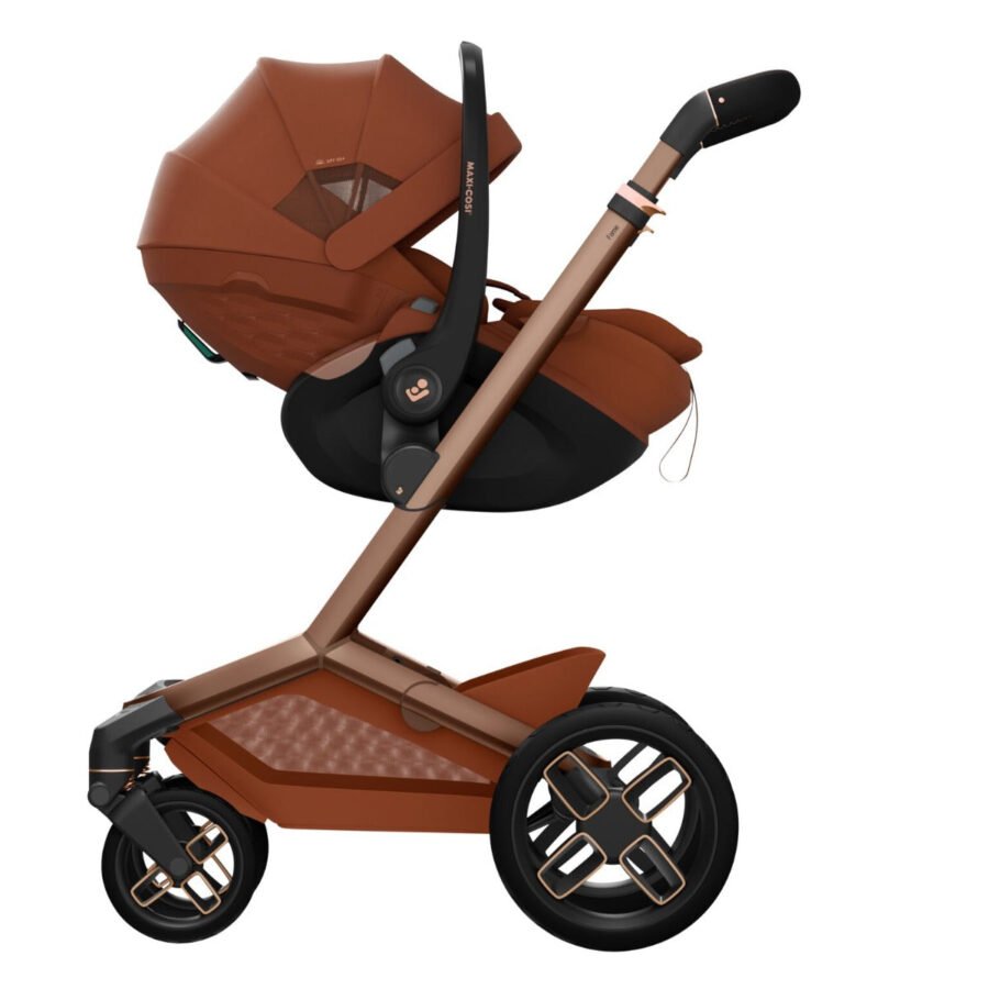 Maxi-Cosi Pebble Slide Pro autokrēsliņš brūnā krāsā ar melnu pamatni un rokturi