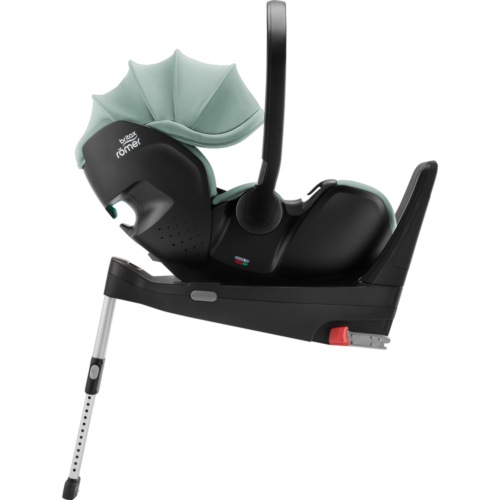 Britax Römer autokrēsliņš ar gaiši zaļu saulessargu un balstu pamatni